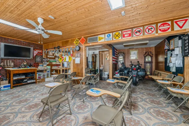 a bathroom with a sink toilet and a mirror