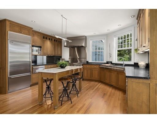 14 Byron Road Weston, MA 02493 - Photo 11 of 33 a kitchen with stainless steel appliances granite countertop a kitchen island a stove and a sink