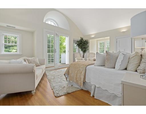 14 Byron Road Weston, MA 02493 - Photo 20 of 33 a living room with a bed furniture and a large window
