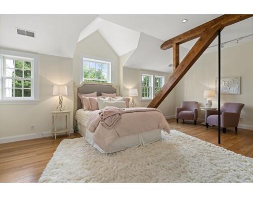 14 Byron Road Weston, MA 02493 - Photo 21 of 33 a bedroom with a bed a couch and windows