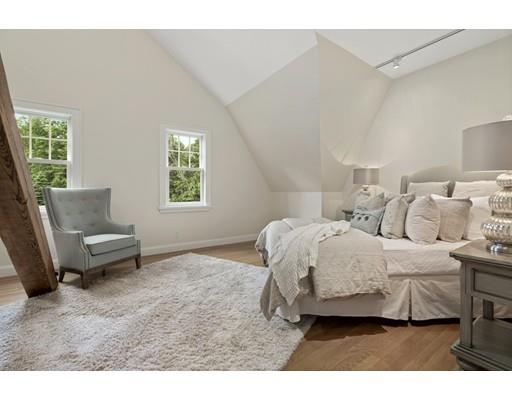 14 Byron Road Weston, MA 02493 - Photo 22 of 33 a bedroom with a bed and a couch