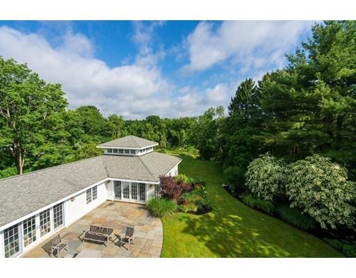 14 Byron Road Weston, MA 02493 - Photo 30 of 33 a view of a big house with a big yard plants and large trees