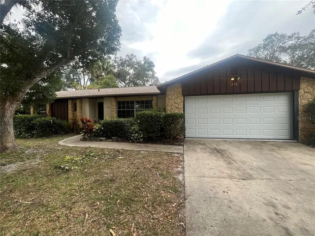 a front view of house with yard