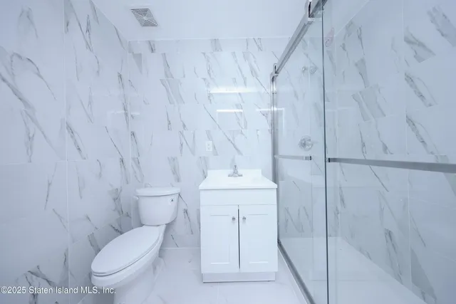 $850,000 | 12 Simonson Avenue | Mariners Harbor