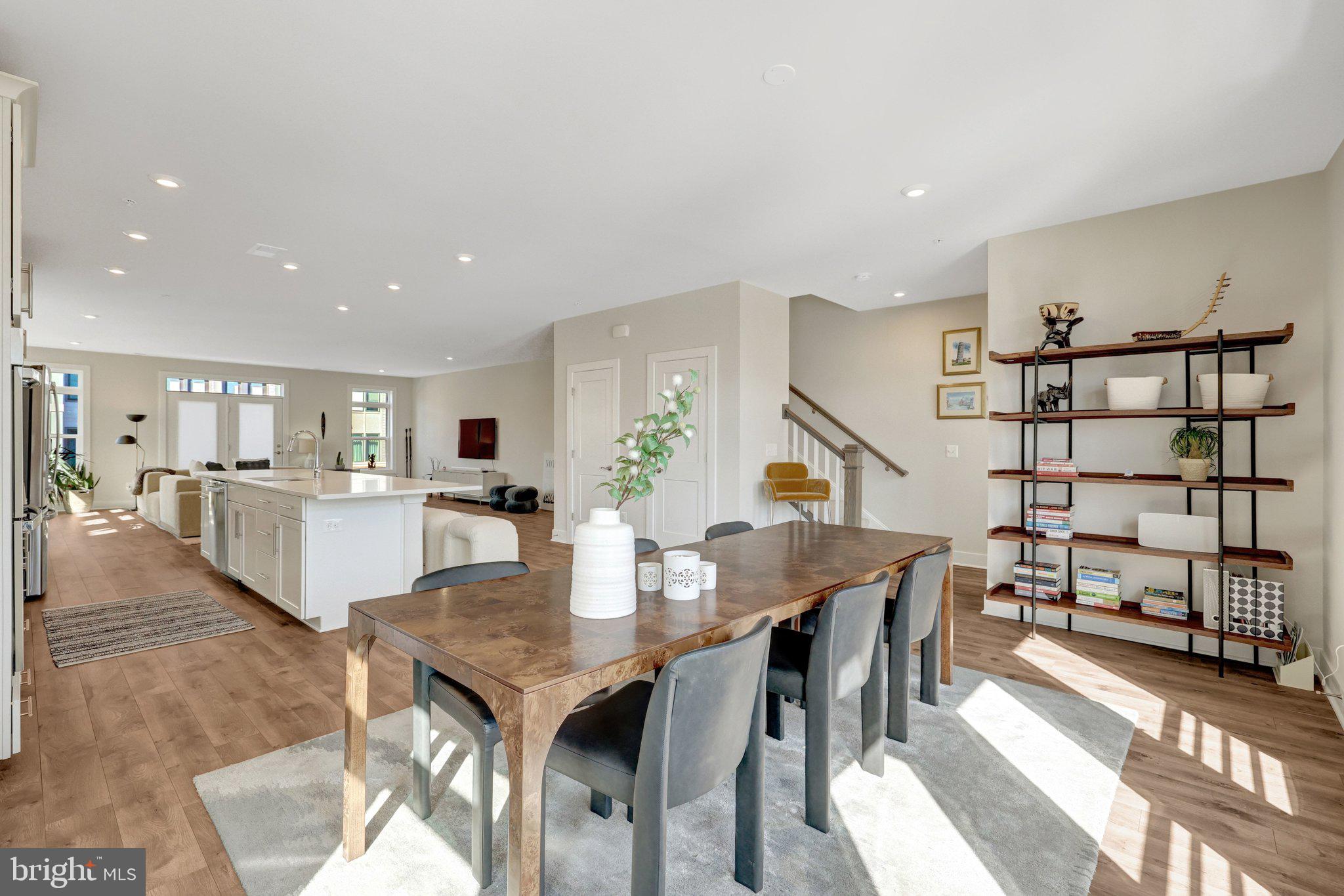 1694 Bandit Loop, Unit 17B Reston, VA 20190 - Photo 15 of 46 a view of a dining room with furniture and a rug
