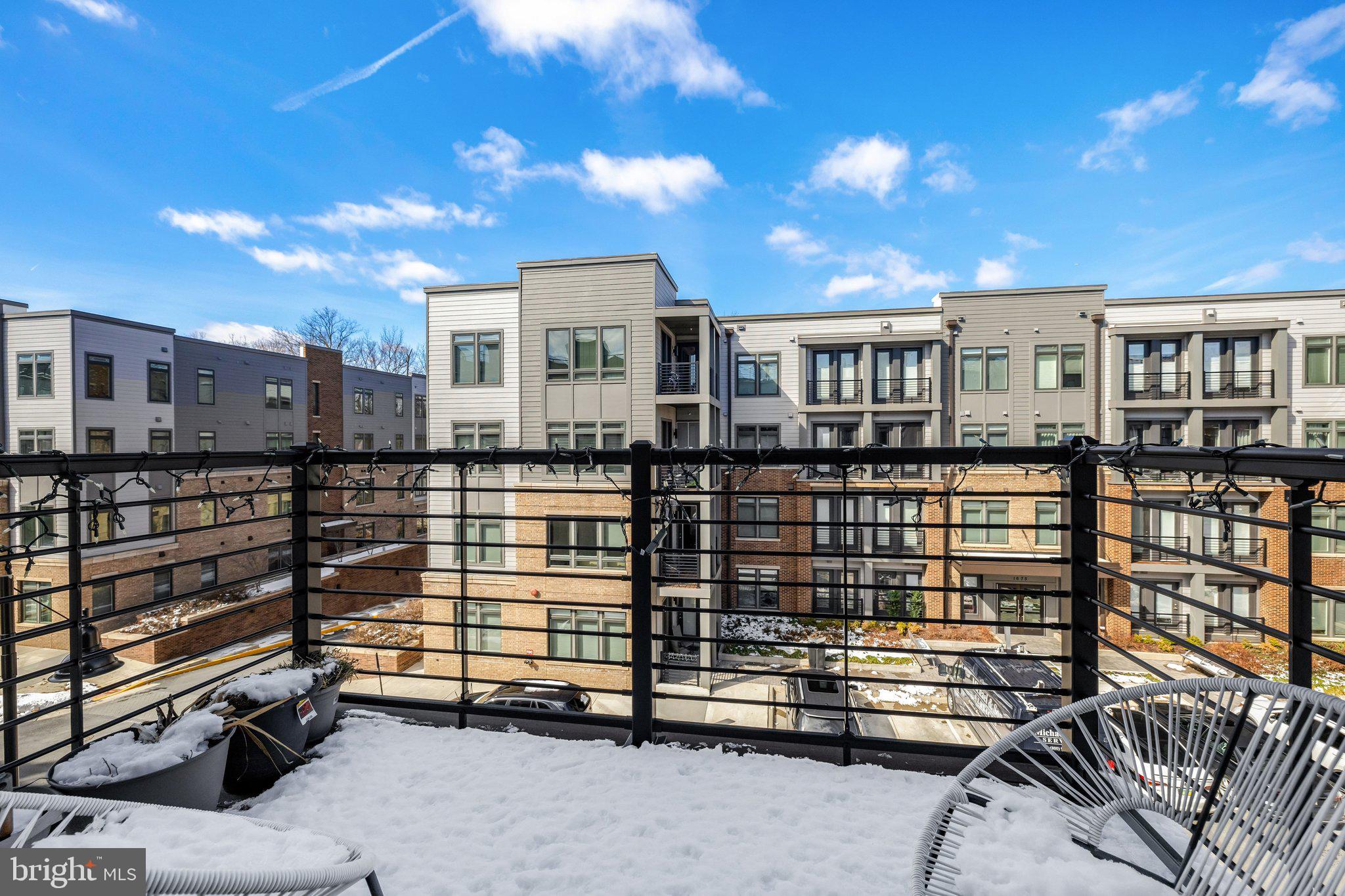 1694 Bandit Loop, Unit 17B Reston, VA 20190 - Photo 17 of 46 a view of a balcony with city view