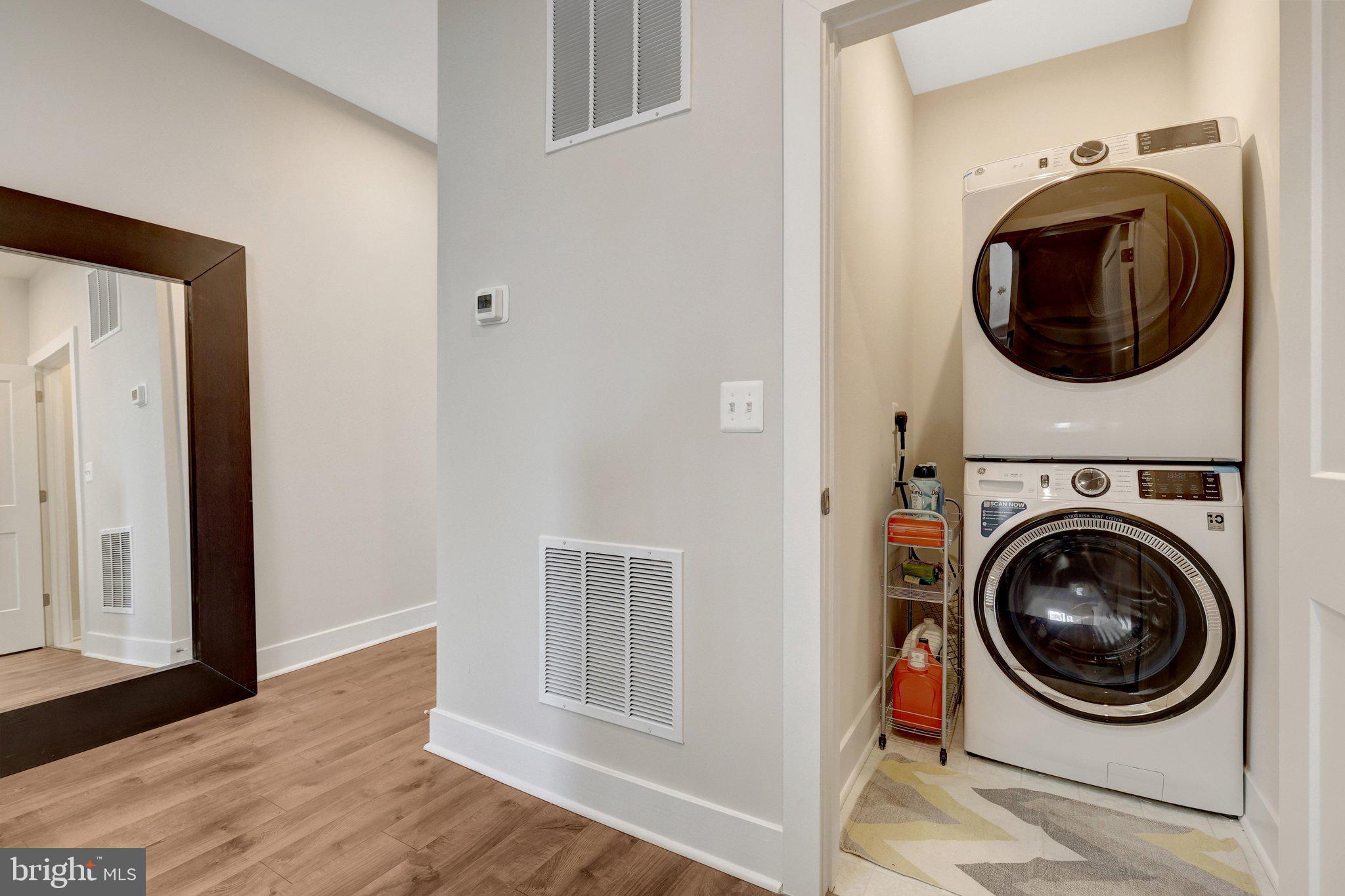 1694 Bandit Loop, Unit 17B Reston, VA 20190 - Photo 34 of 46 a view of a hallway with washer and dryer