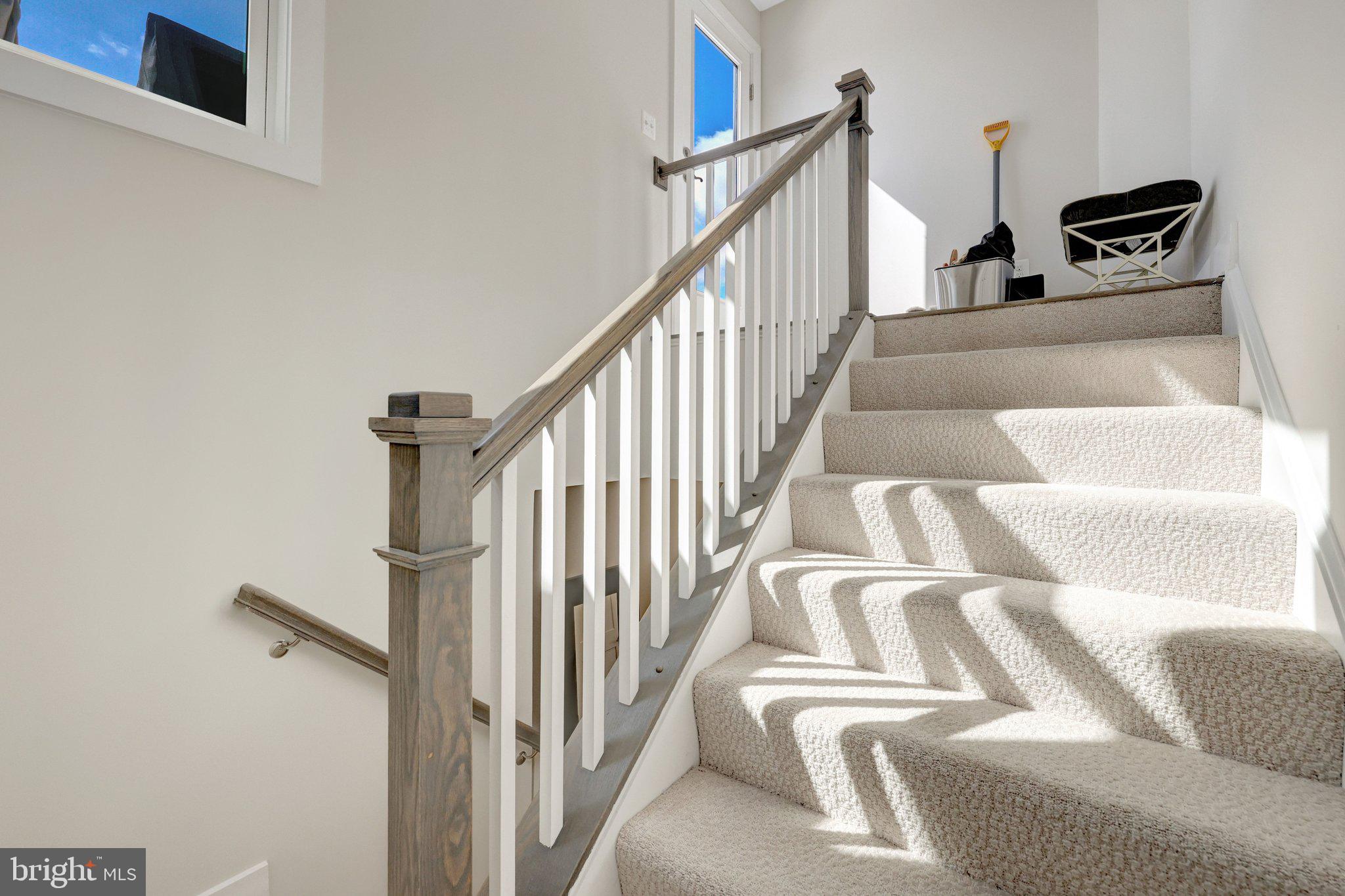 1694 Bandit Loop, Unit 17B Reston, VA 20190 - Photo 35 of 46 a view of staircase with white walls