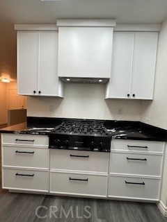 15177 Braxton Street Adelanto, CA 92301 - Photo 11 of 34 a white stove top oven sitting inside of a kitchen