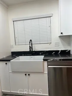 a bathroom with a sink and a bathtub