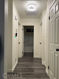 15177 Braxton Street Adelanto, CA 92301 - Photo 13 of 34 a view of a hallway with wooden floor and staircase