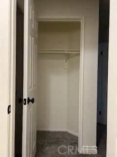 a bathroom with a glass door