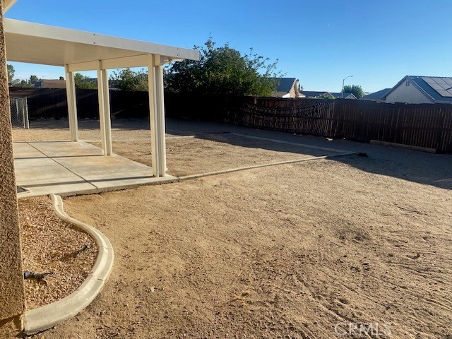 15177 Braxton Street Adelanto, CA 92301 - Photo 28 of 34 a view of a backyard of a house
