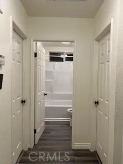 a bathroom with a shower and a sink