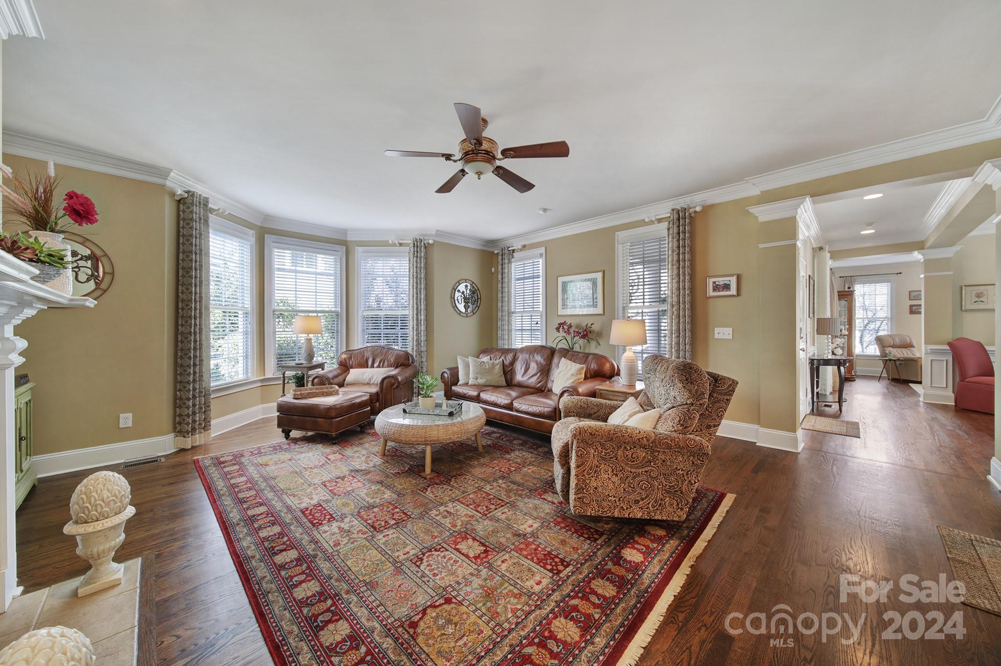 724 Shady Grove Crossing Fort Mill, SC 29708 - Photo 14 of 48 a living room with furniture and a wooden floor