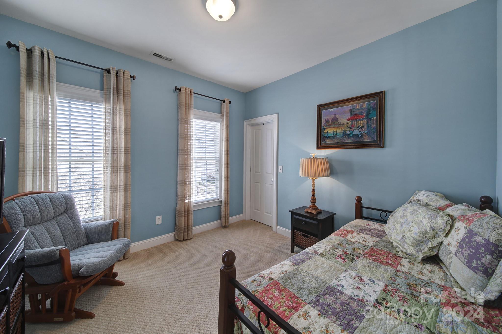 724 Shady Grove Crossing Fort Mill, SC 29708 - Photo 32 of 48 a bedroom with a bed and a window