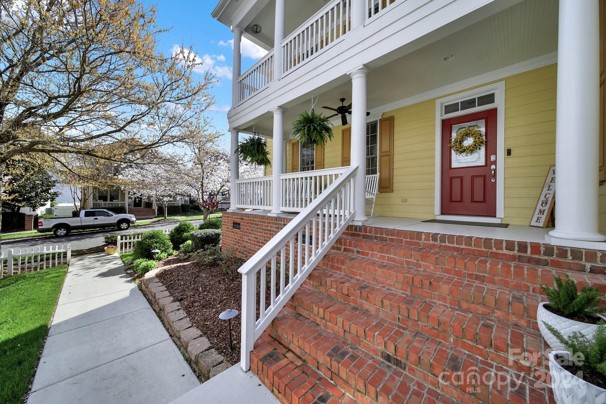 724 Shady Grove Crossing Fort Mill, SC 29708 - Photo 6 of 48 a view of a house with a porch