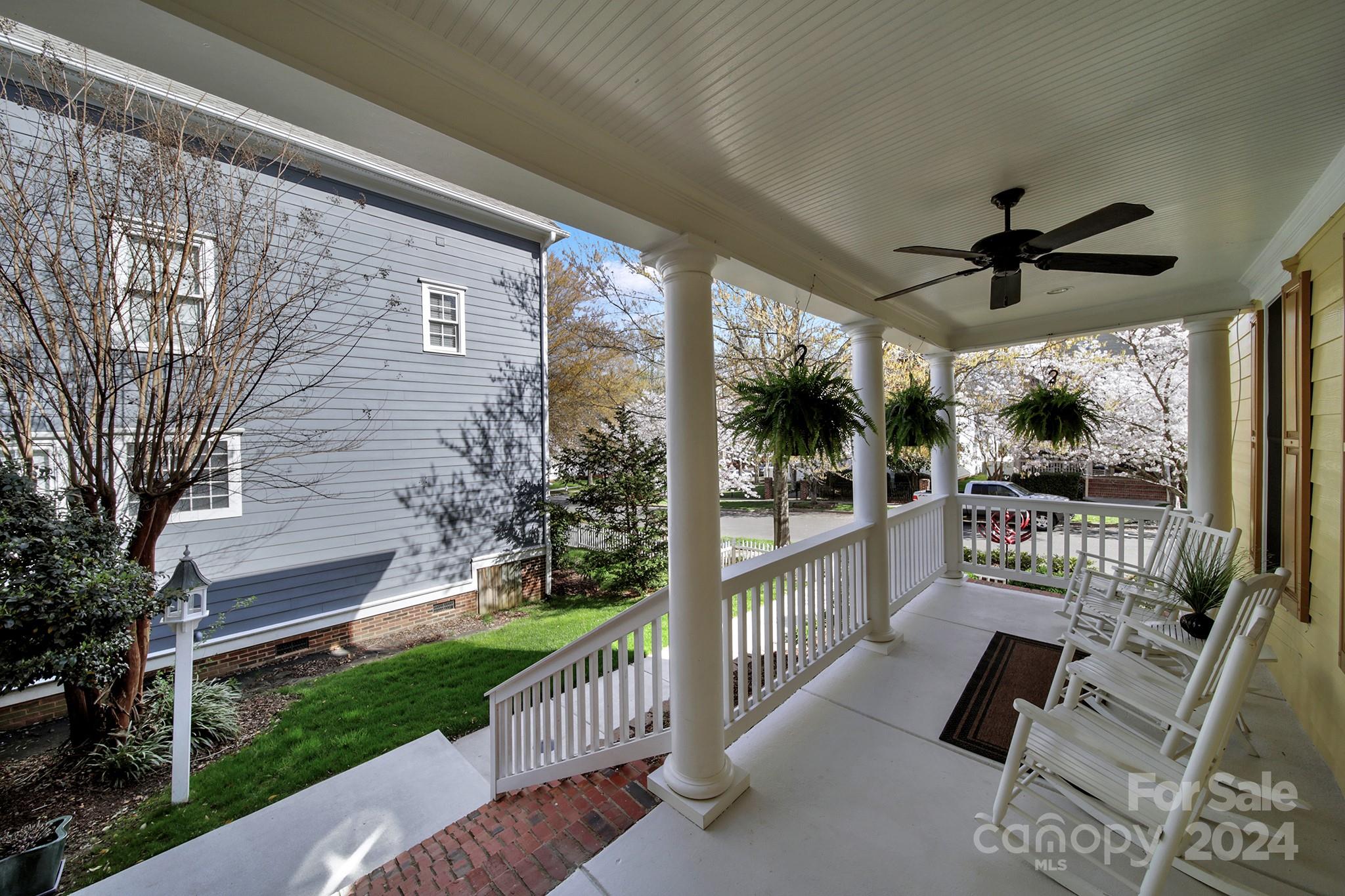 724 Shady Grove Crossing Fort Mill, SC 29708 - Photo 7 of 48 a view of a porch with furniture and a yard