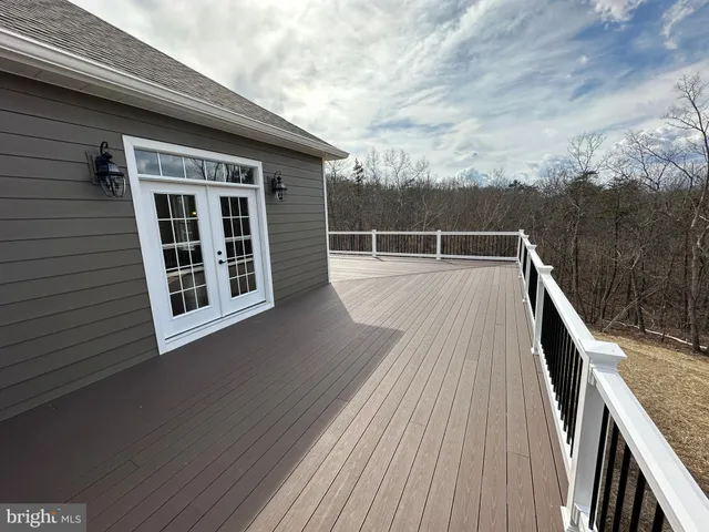 a view of outdoor space with deck and oven