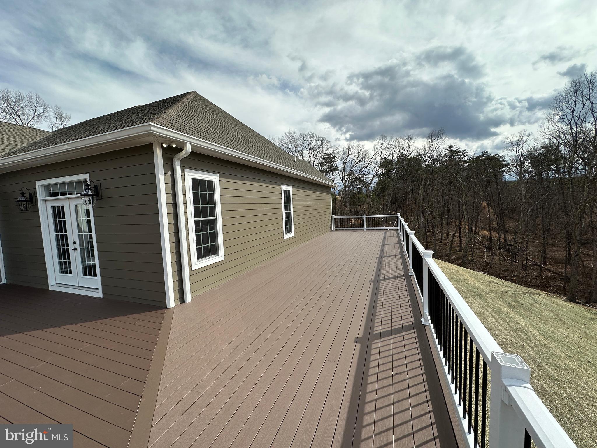 2225 Cedar Grove Road Winchester, VA 22603 - Photo 15 of 48 a house view with wooden deck and barbeque oven