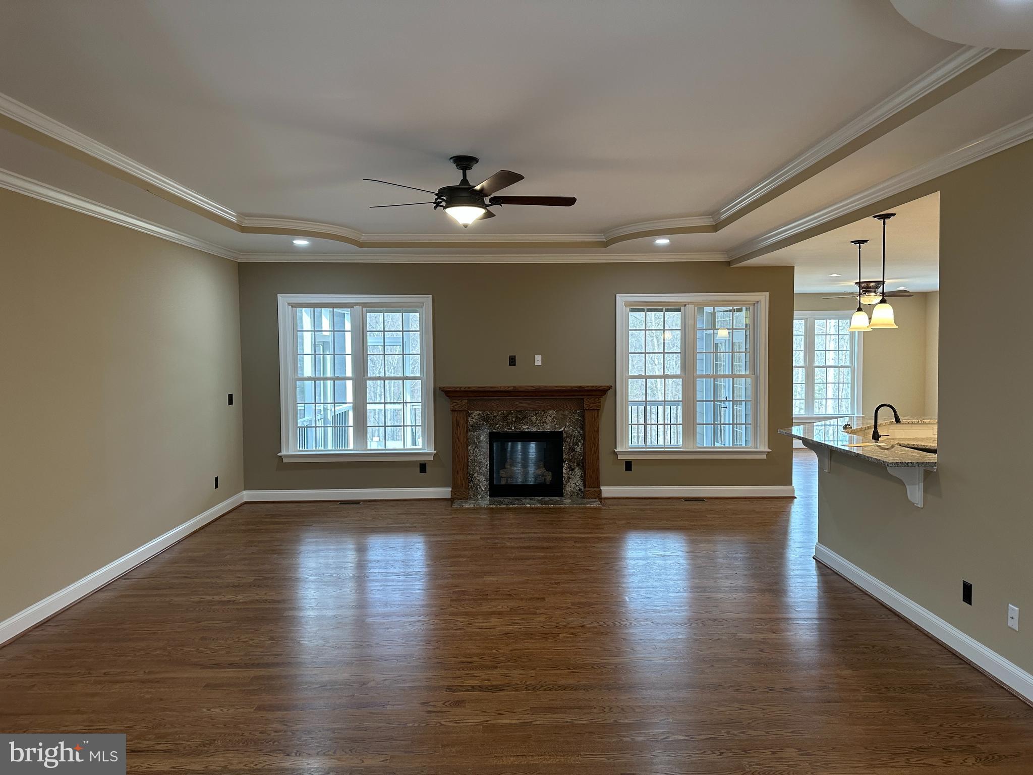 2225 Cedar Grove Road Winchester, VA 22603 - Photo 22 of 48 a view of a livingroom with fireplace wooden floor and a window