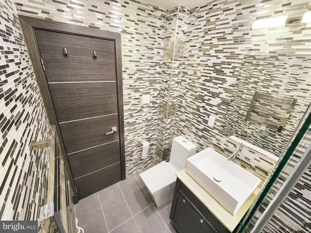 a view of an empty room with stairs