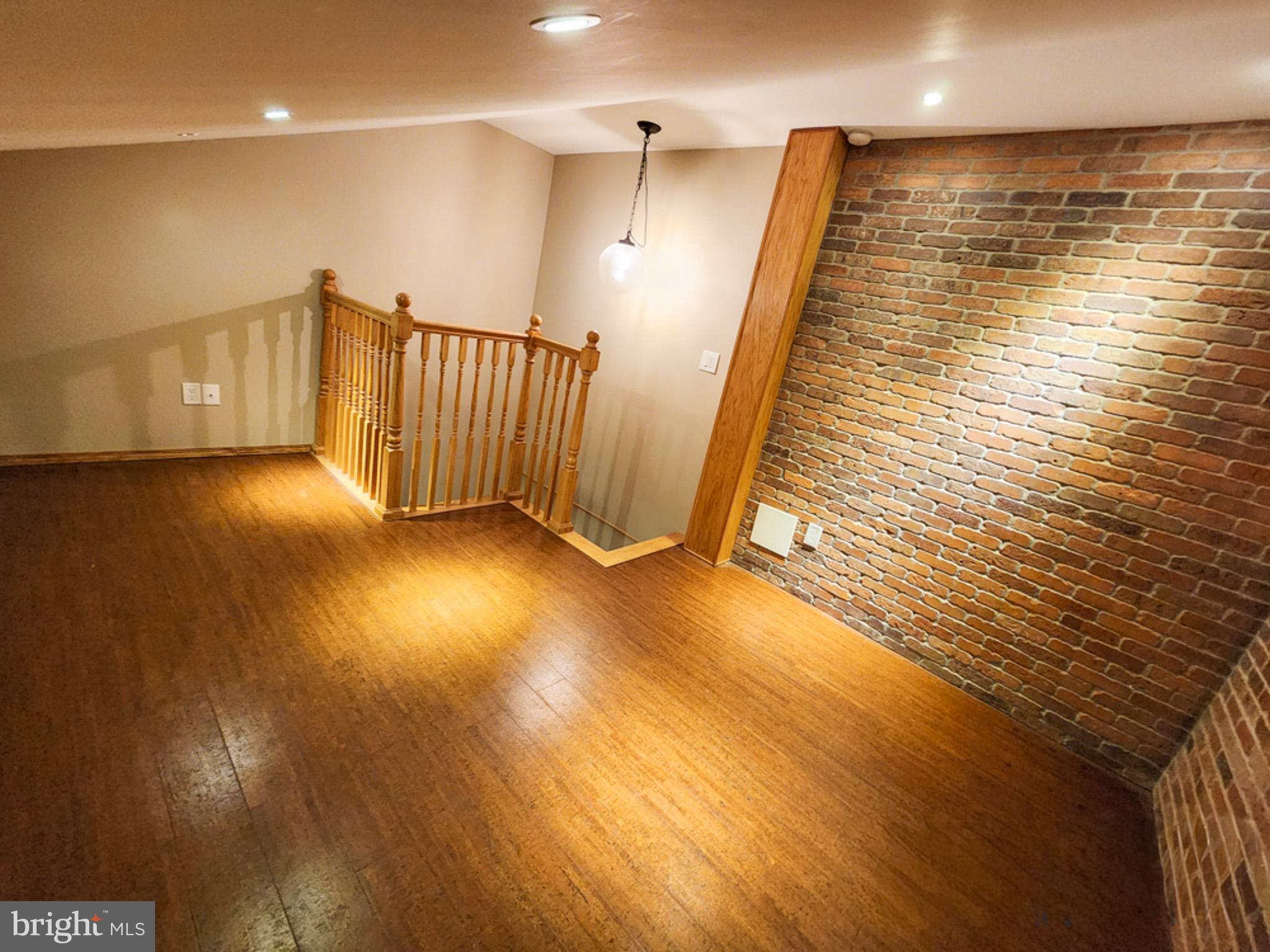 12135 Academy Road, Unit 77 Philadelphia, PA 19154 - Photo 10 of 12 a view of an empty room with stairs