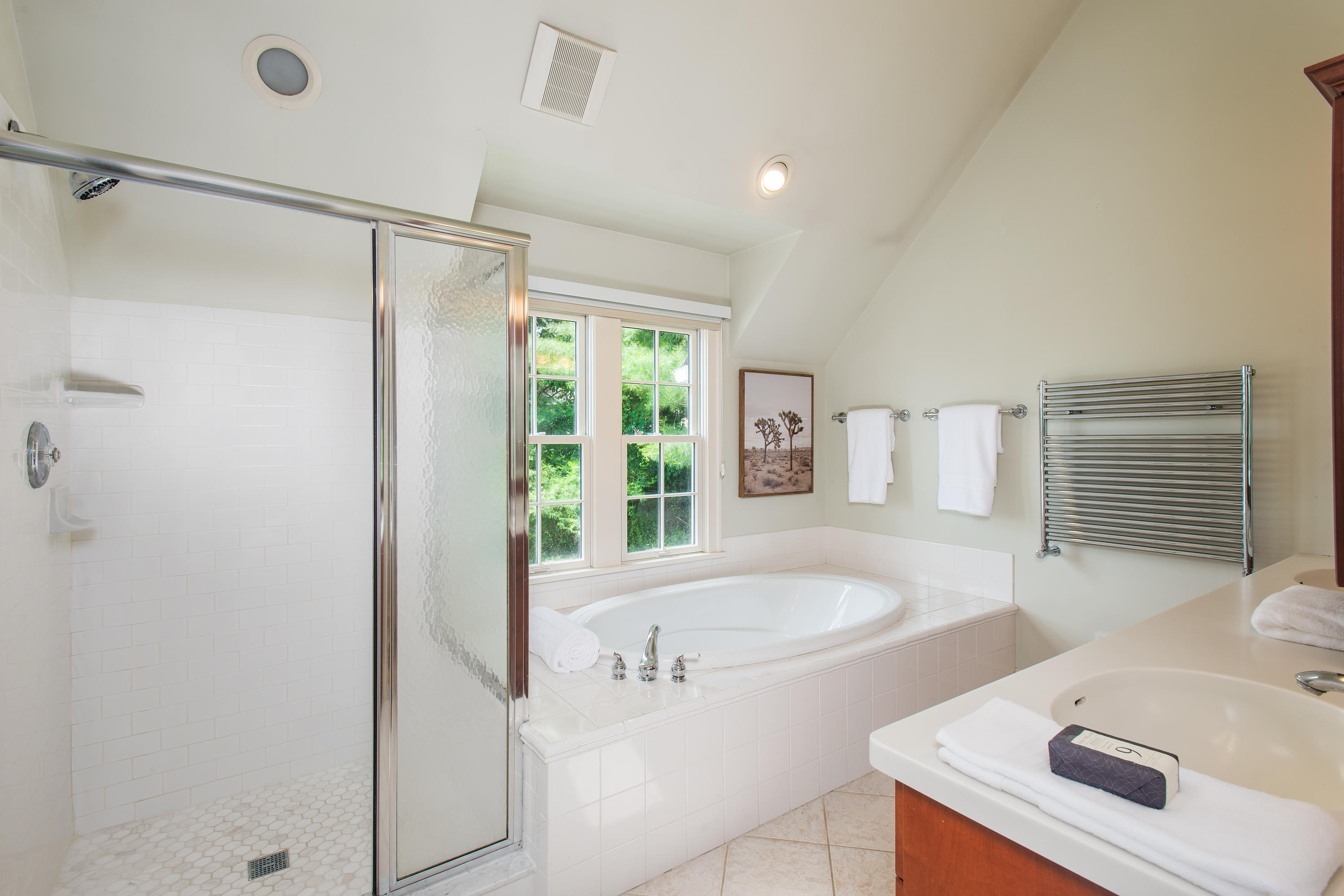 13 Valley Road Norwalk, CT 06854 - Photo 19 of 40 a bathroom with a tub sink and mirror