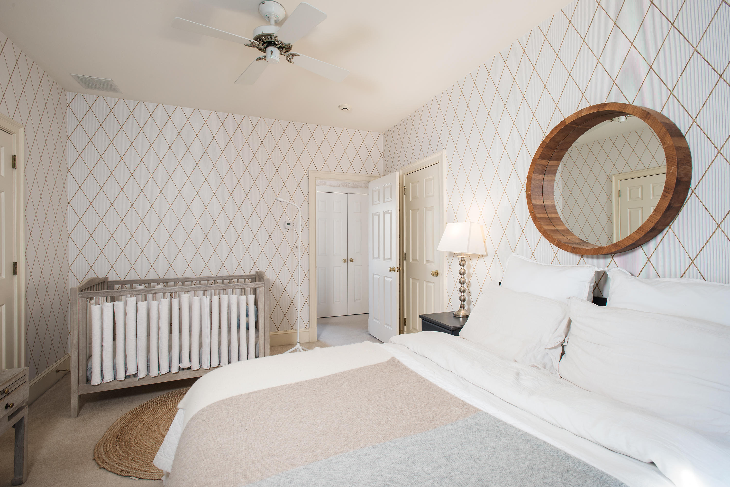 13 Valley Road Norwalk, CT 06854 - Photo 20 of 40 a bedroom with a bed and a large mirror
