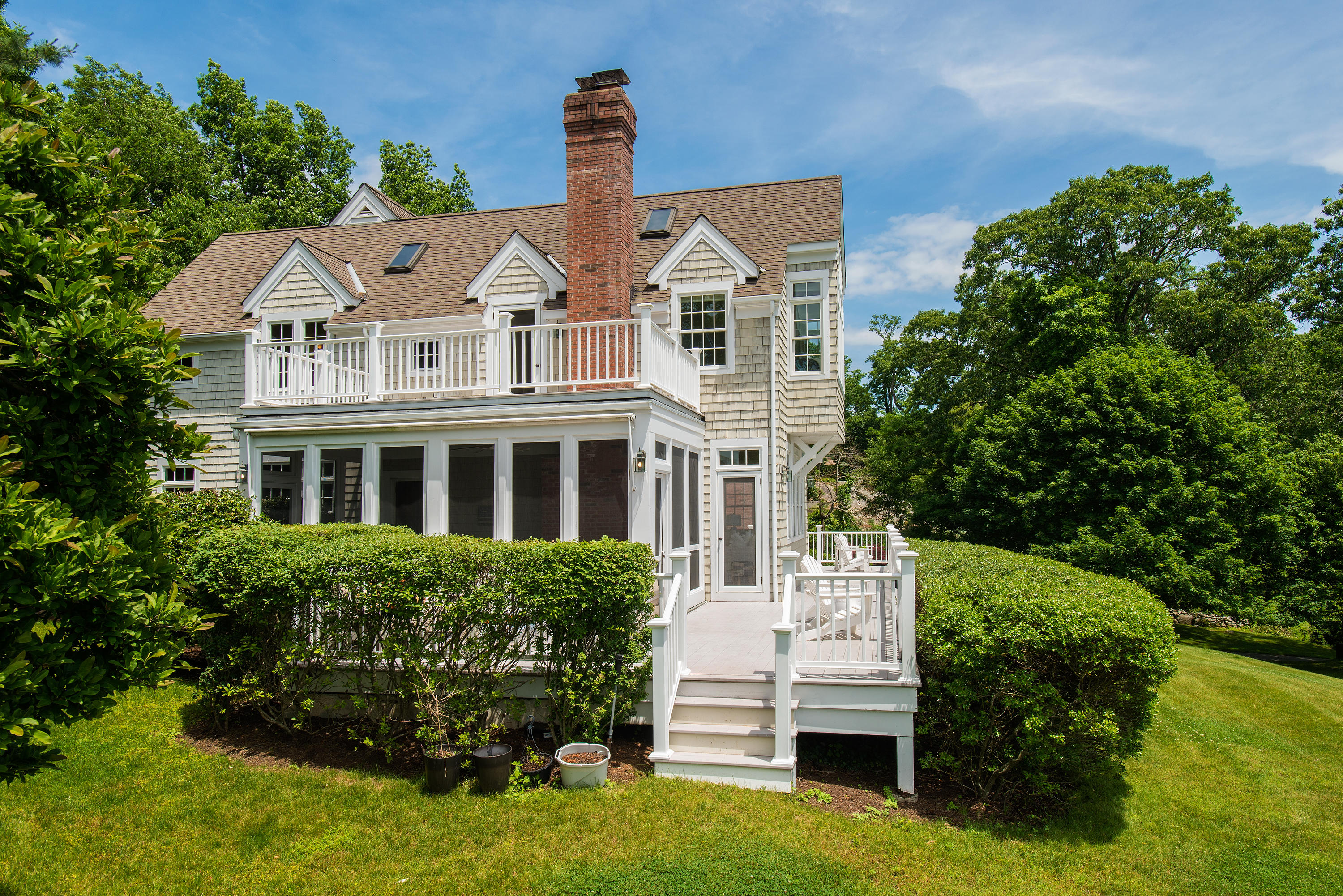13 Valley Road Norwalk, CT 06854 - Photo 27 of 40 a front view of a house with a garden