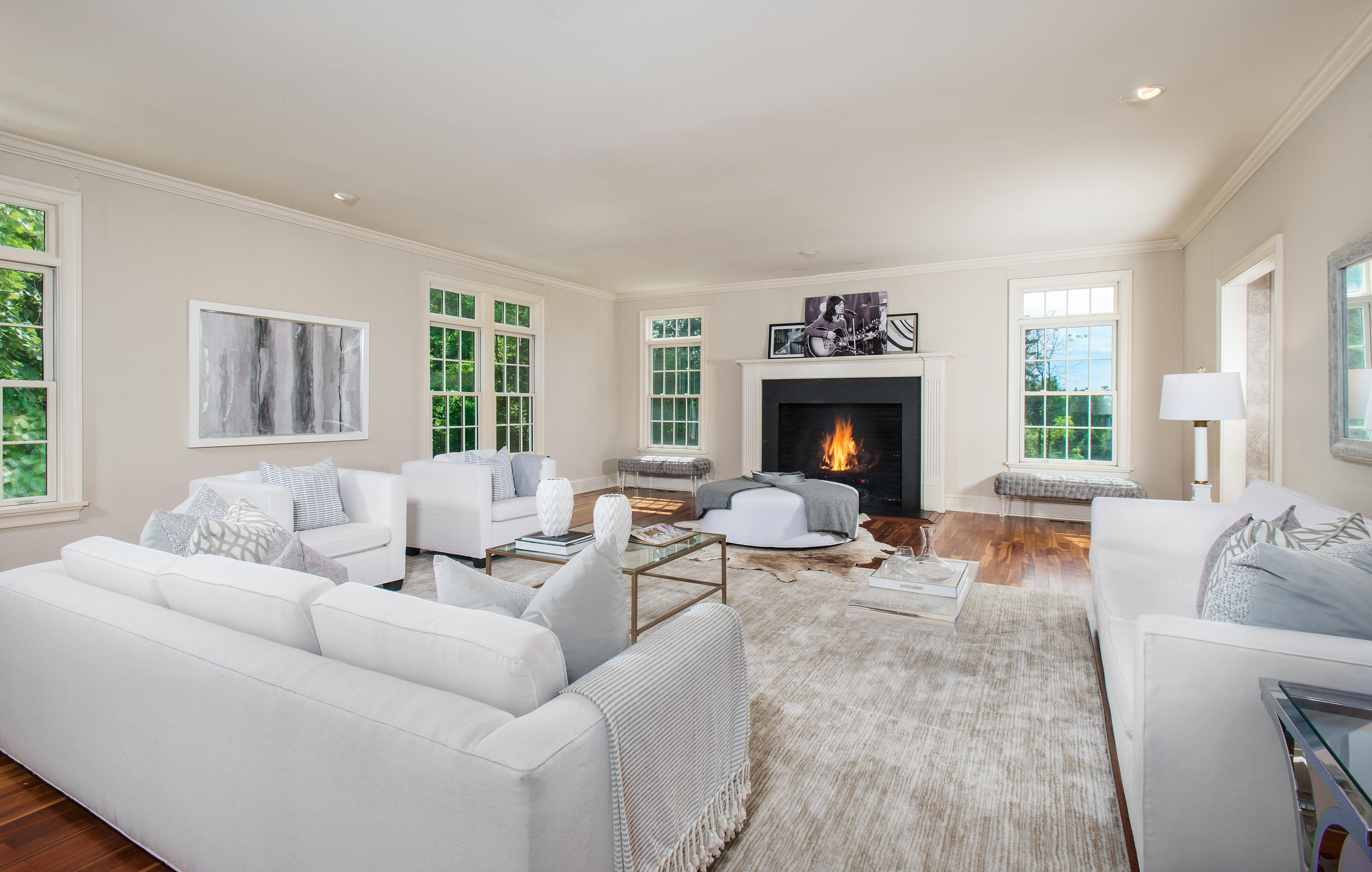 13 Valley Road Norwalk, CT 06854 - Photo 5 of 40 a living room with furniture fireplace and a large window