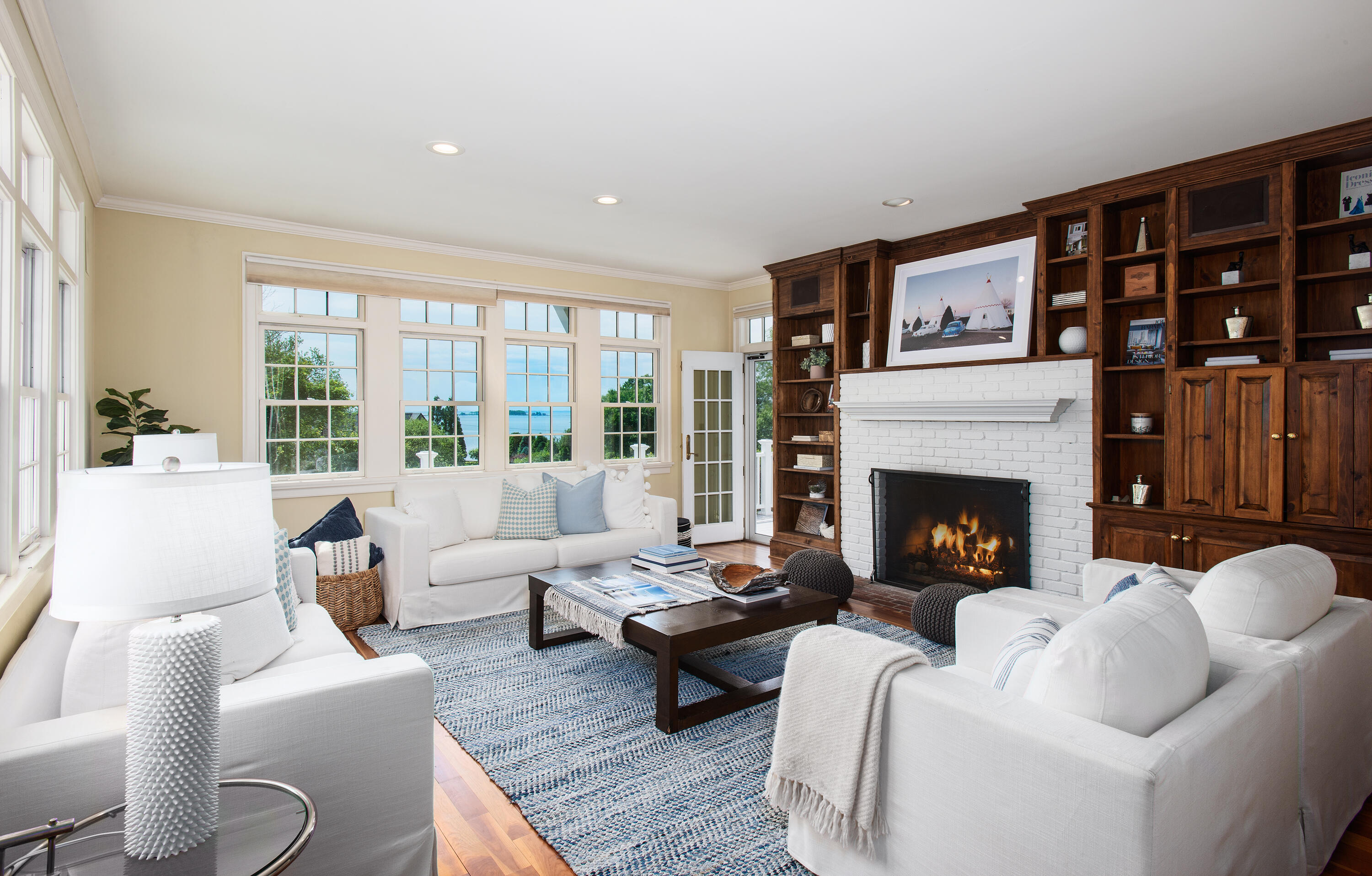 13 Valley Road Norwalk, CT 06854 - Photo 10 of 40 a living room with furniture large window and a fireplace