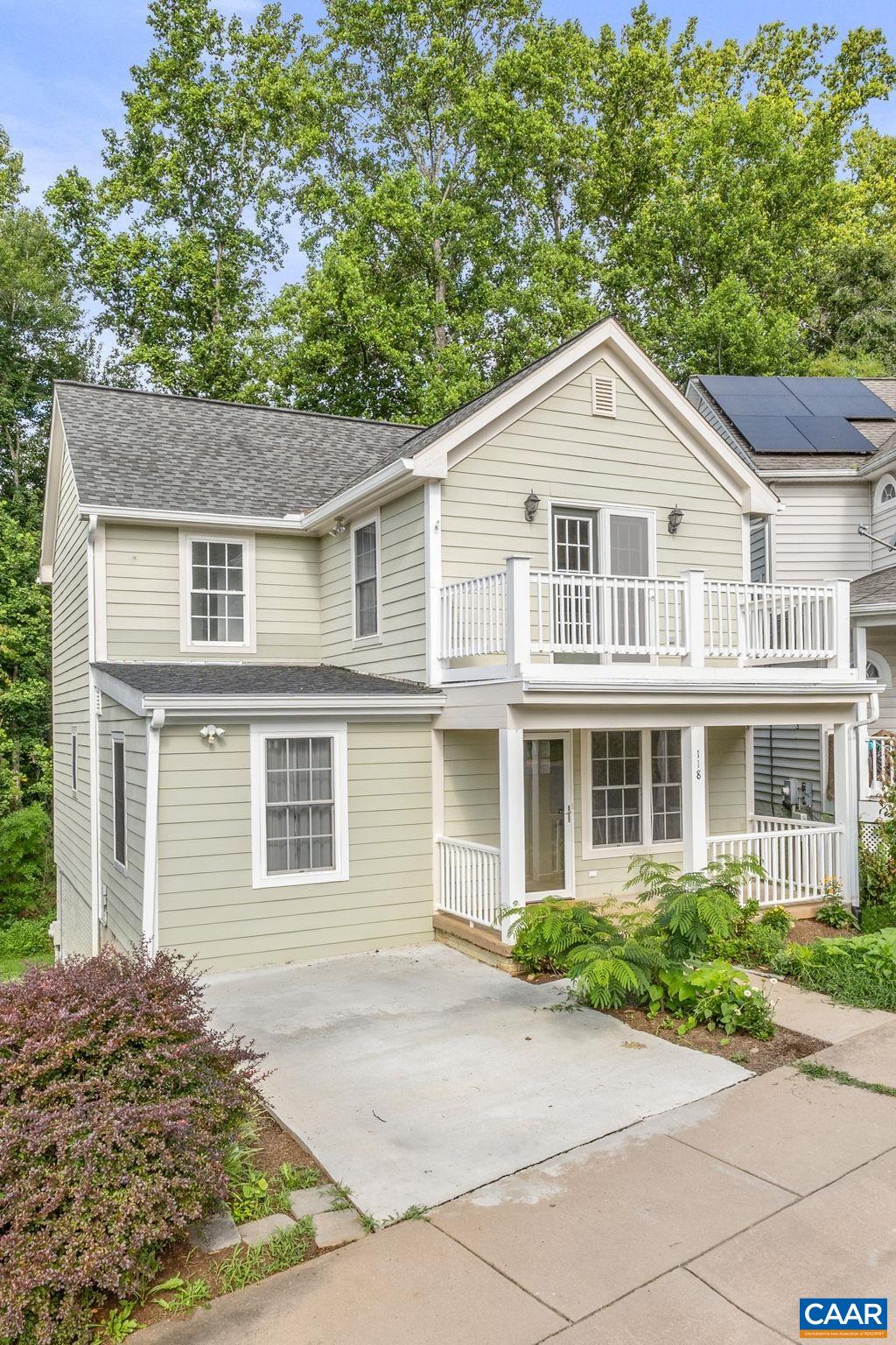 118 Roy's Place Charlottesville, VA 22902 - Photo 2 of 42 a front view of a house with a yard