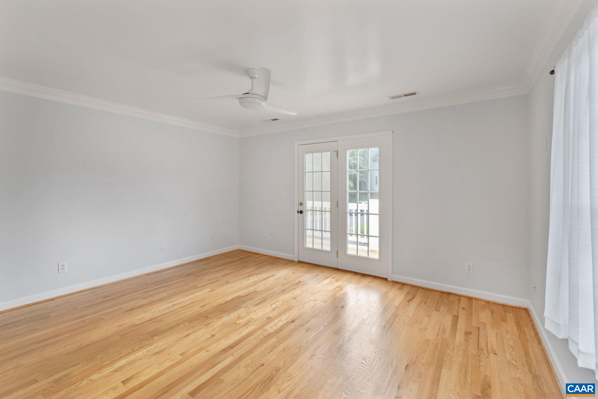 118 Roy's Place Charlottesville, VA 22902 - Photo 25 of 42 wooden floor in an empty room with a window