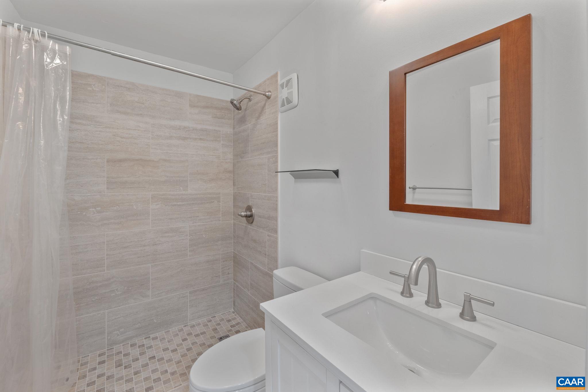 118 Roy's Place Charlottesville, VA 22902 - Photo 28 of 42 a bathroom with a sink toilet and shower