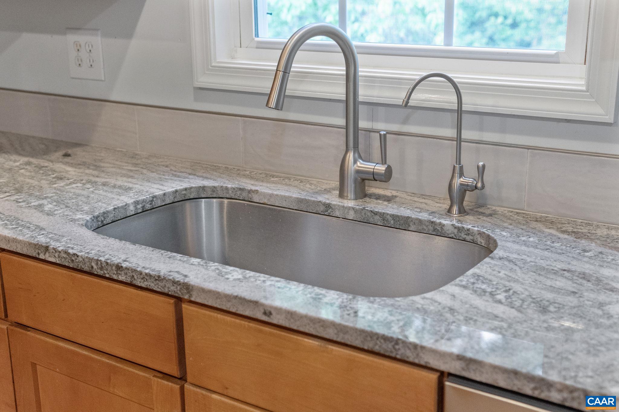 118 Roy's Place Charlottesville, VA 22902 - Photo 34 of 42 a close view of a sink and a window