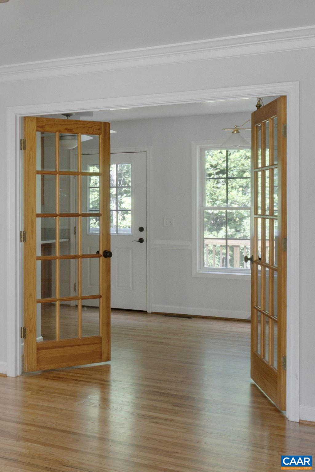 118 Roy's Place Charlottesville, VA 22902 - Photo 39 of 42 a view of an empty room with wooden floor and a window