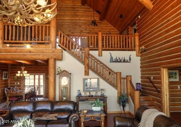 a view of entryway livingroom and hall with wooden floor