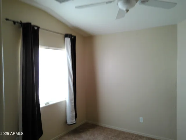 a view of a room with rack on the wall