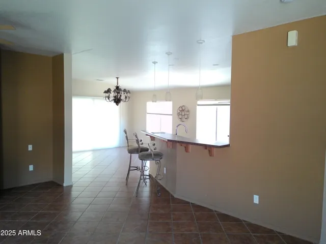 a workspace with furniture and window