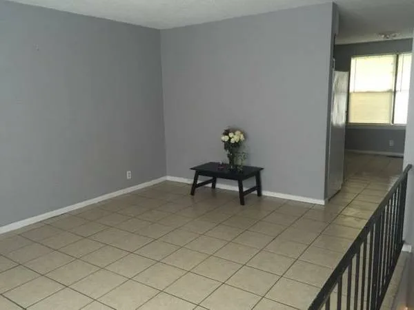 a kitchen with stainless steel appliances a refrigerator and a sink