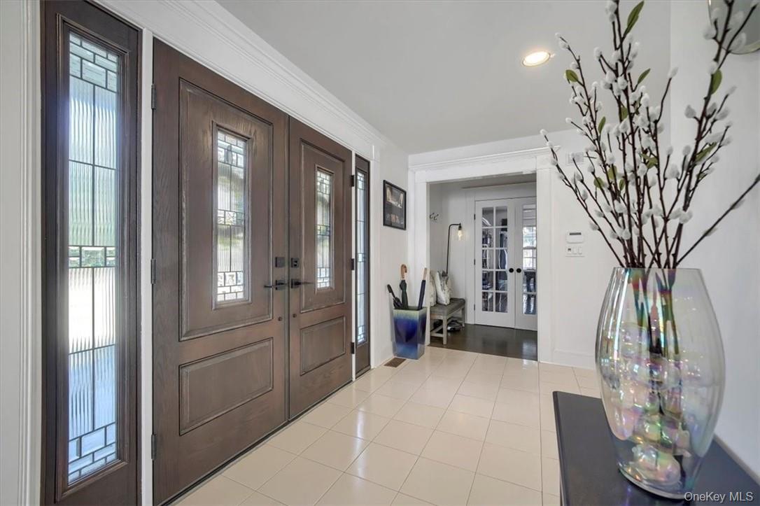 10 High Tor Road New City, NY 10956 - Photo 2 of 33 a hallway with furniture and wooden floor
