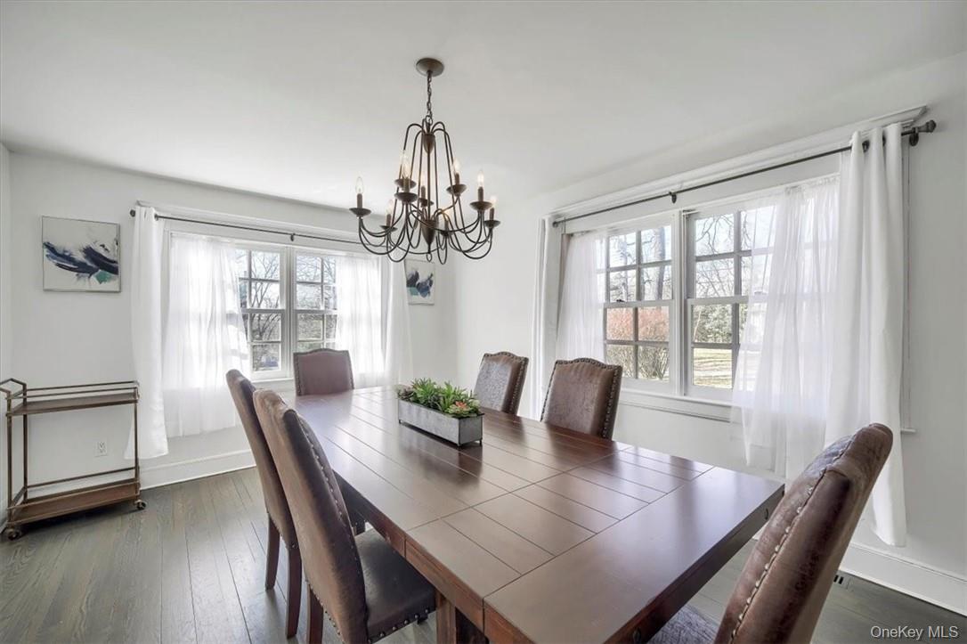 10 High Tor Road New City, NY 10956 - Photo 8 of 33 a view of a dining room with furniture window and wooden floor