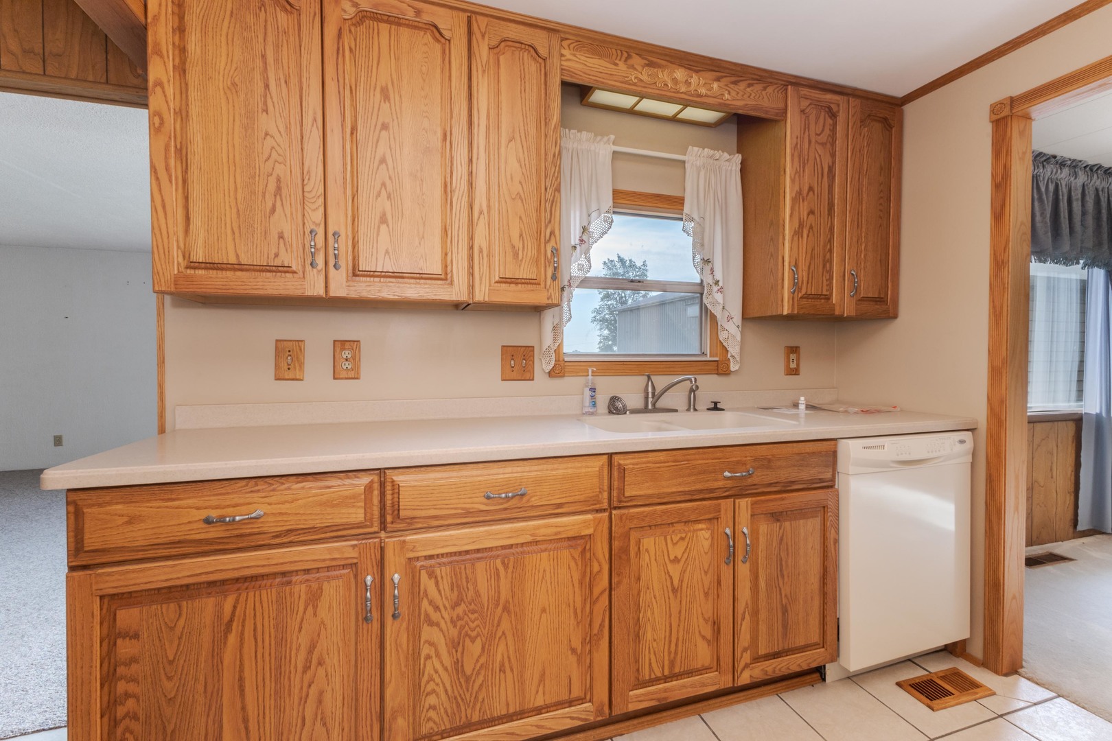 502 South Union Street Dwight, IL 60420 - Photo 16 of 47 a kitchen with granite countertop white cabinets and stainless steel appliances