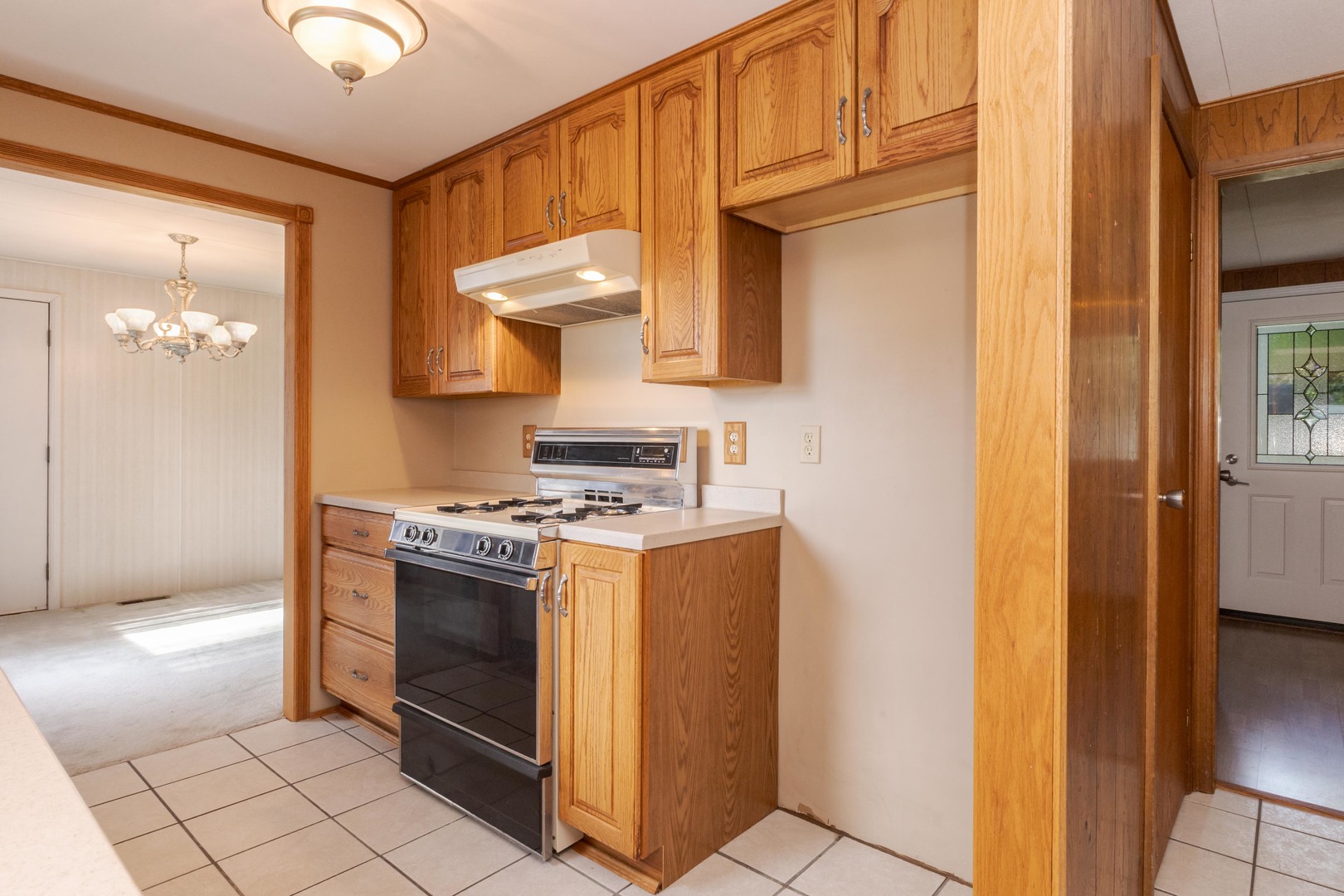 502 South Union Street Dwight, IL 60420 - Photo 18 of 47 a kitchen with stainless steel appliances granite countertop a stove and a refrigerator