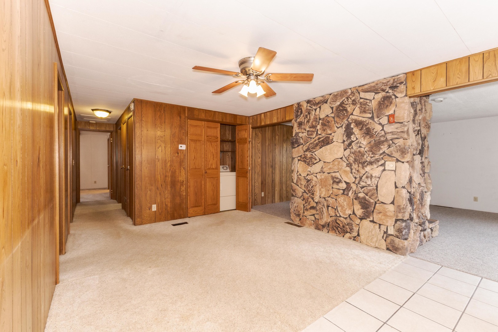 502 South Union Street Dwight, IL 60420 - Photo 19 of 47 a view of a livingroom with a chandelier fan and a window