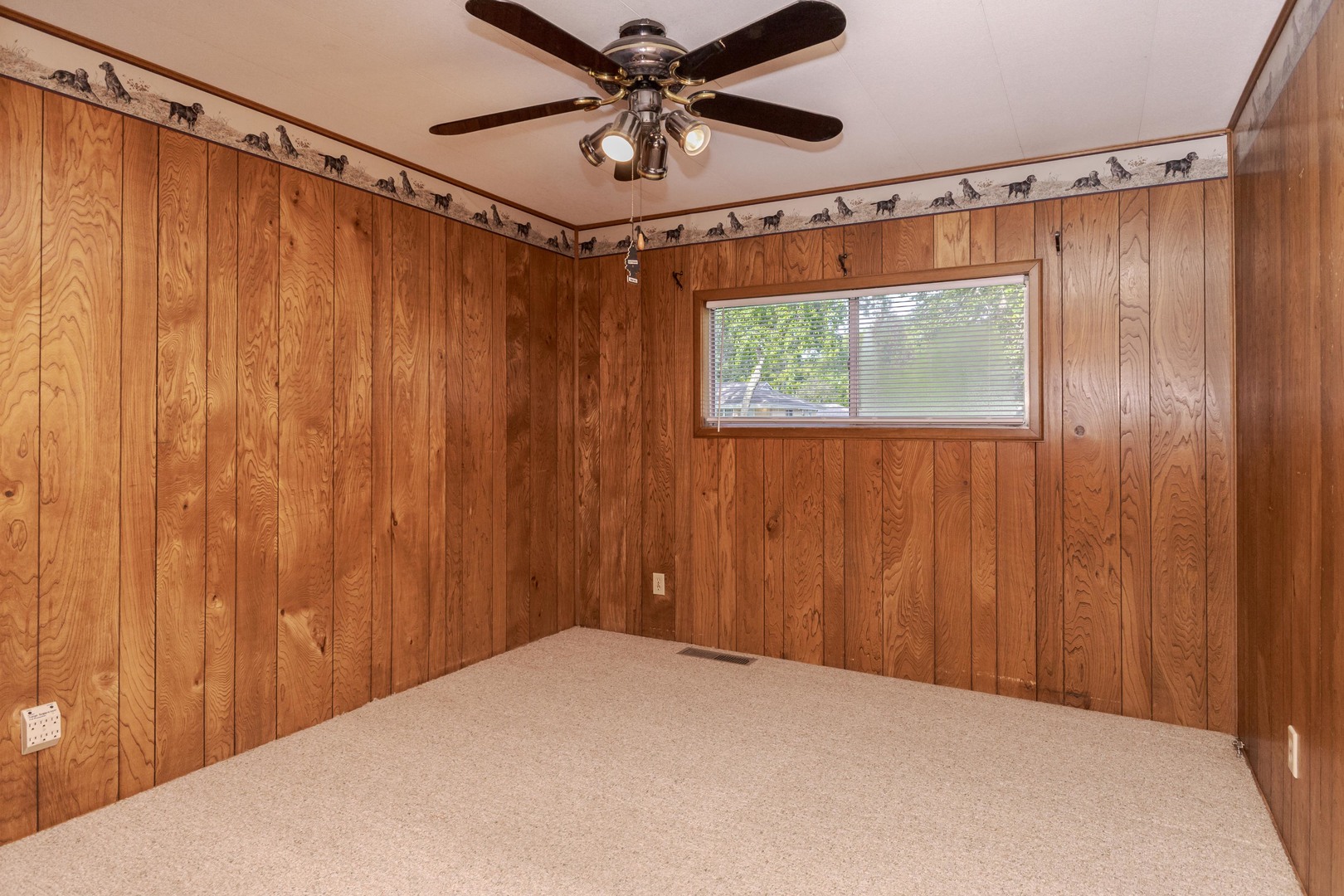502 South Union Street Dwight, IL 60420 - Photo 25 of 47 a view of a room with a window and a ceiling fan