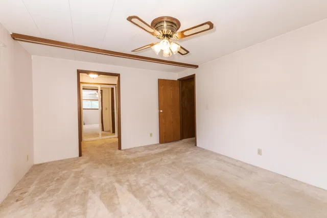 a view of a bathroom with a glass door