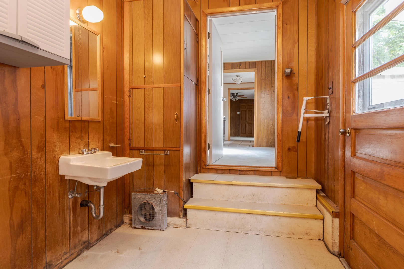 502 South Union Street Dwight, IL 60420 - Photo 36 of 47 a bathroom with a sink and a mirror