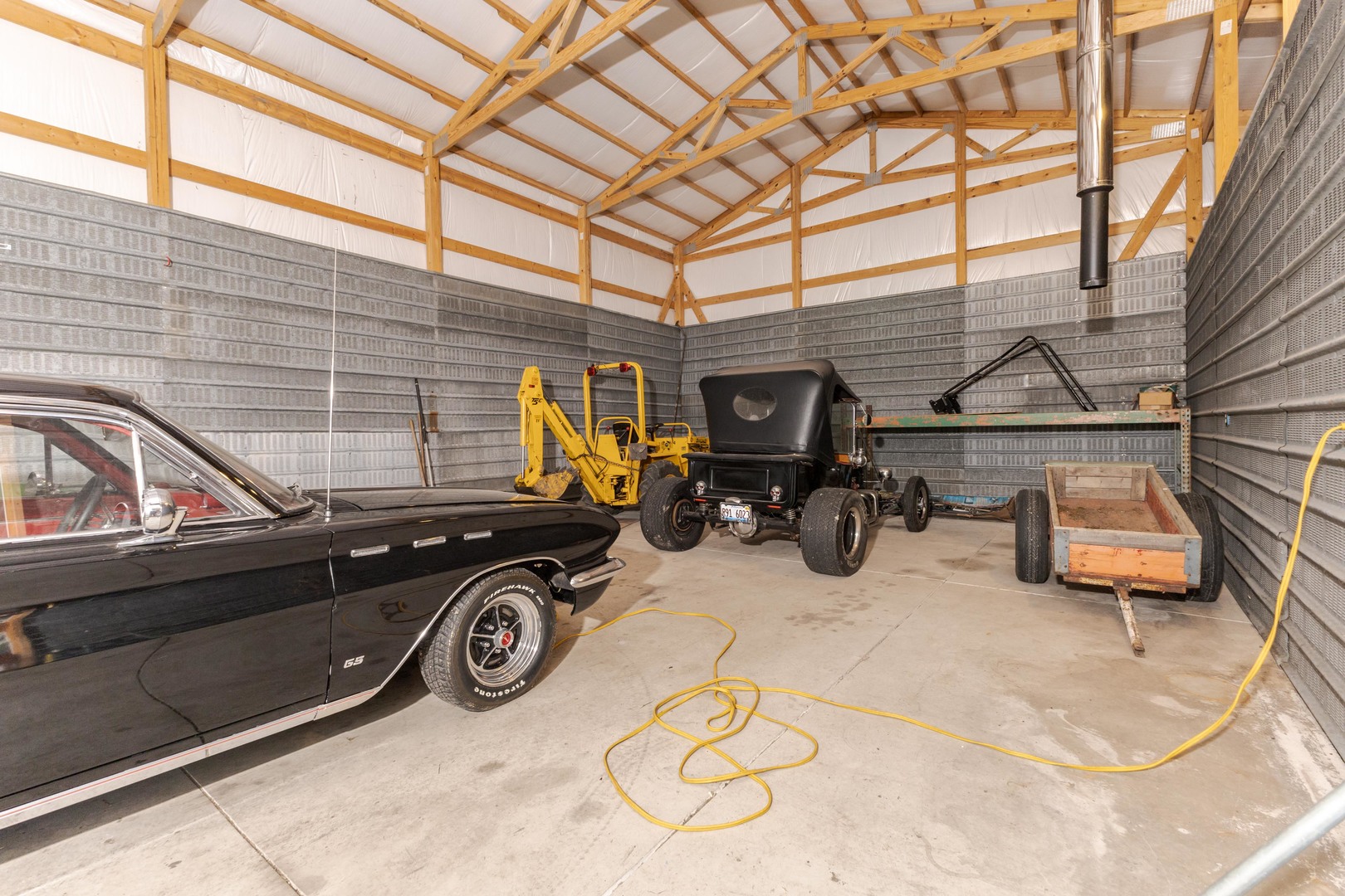 502 South Union Street Dwight, IL 60420 - Photo 43 of 47 a car is parked in front of garage